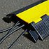 Passage de câble professionnel Plugger CAB-PROTECT-2W : 2 voies, ultra-résistant 30 tonnes, idéal pour protéger câbles lors d'événements et chantiers.
